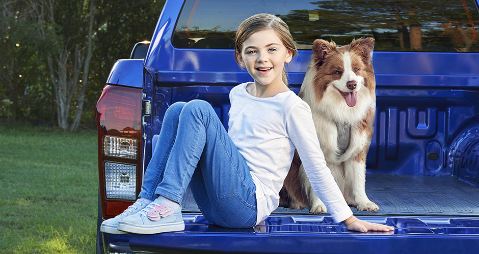headshot of Brook Wayman sitting on a D-MAX